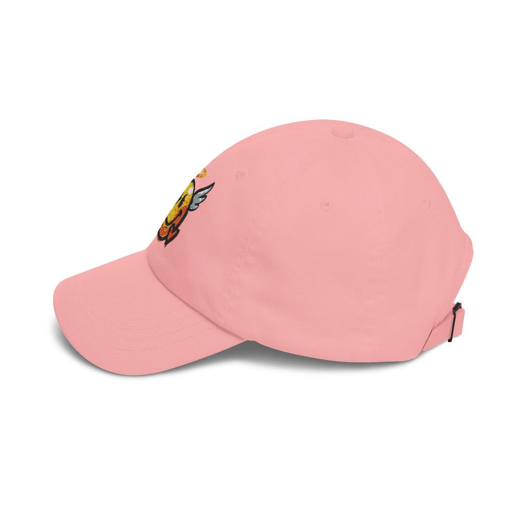 Pink dad cap with embroidered winged smiley and halo on the side