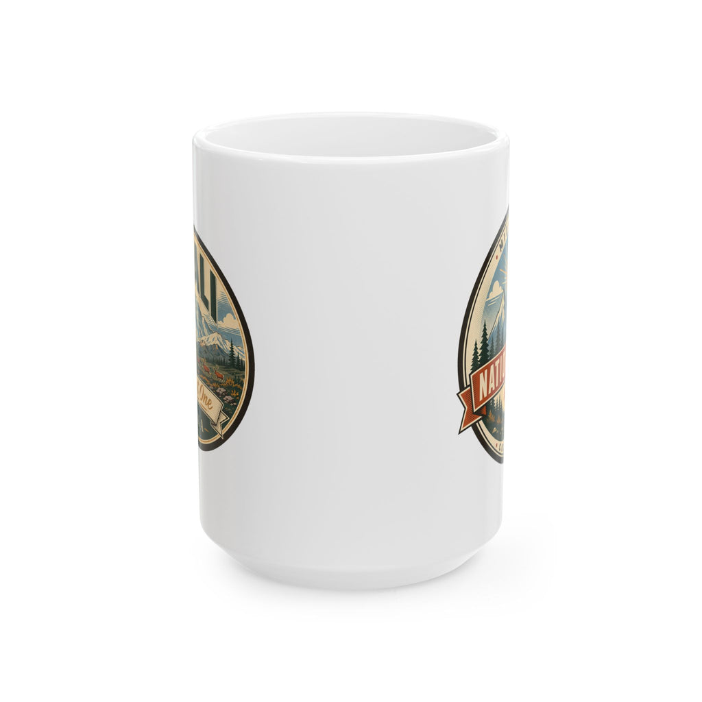 White ceramic mug with vintage-style national park badge graphic on side