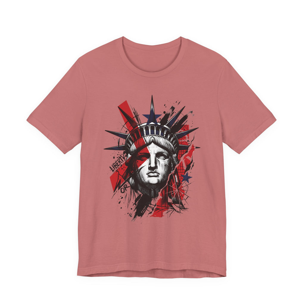 Rose pink graphic t-shirt with Statue of Liberty face illustration in red and black
