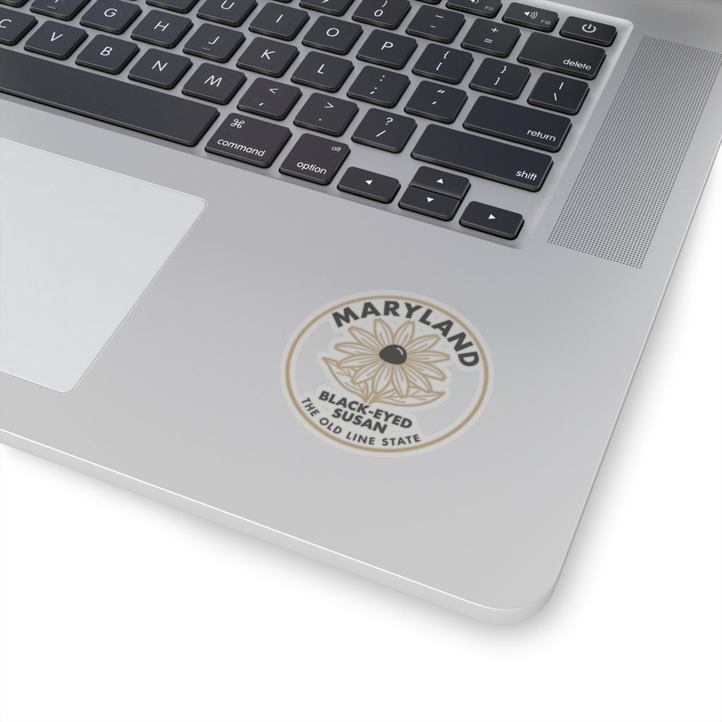 Circular Maryland black-eyed Susan sticker on laptop lid, transparent border, text ring.