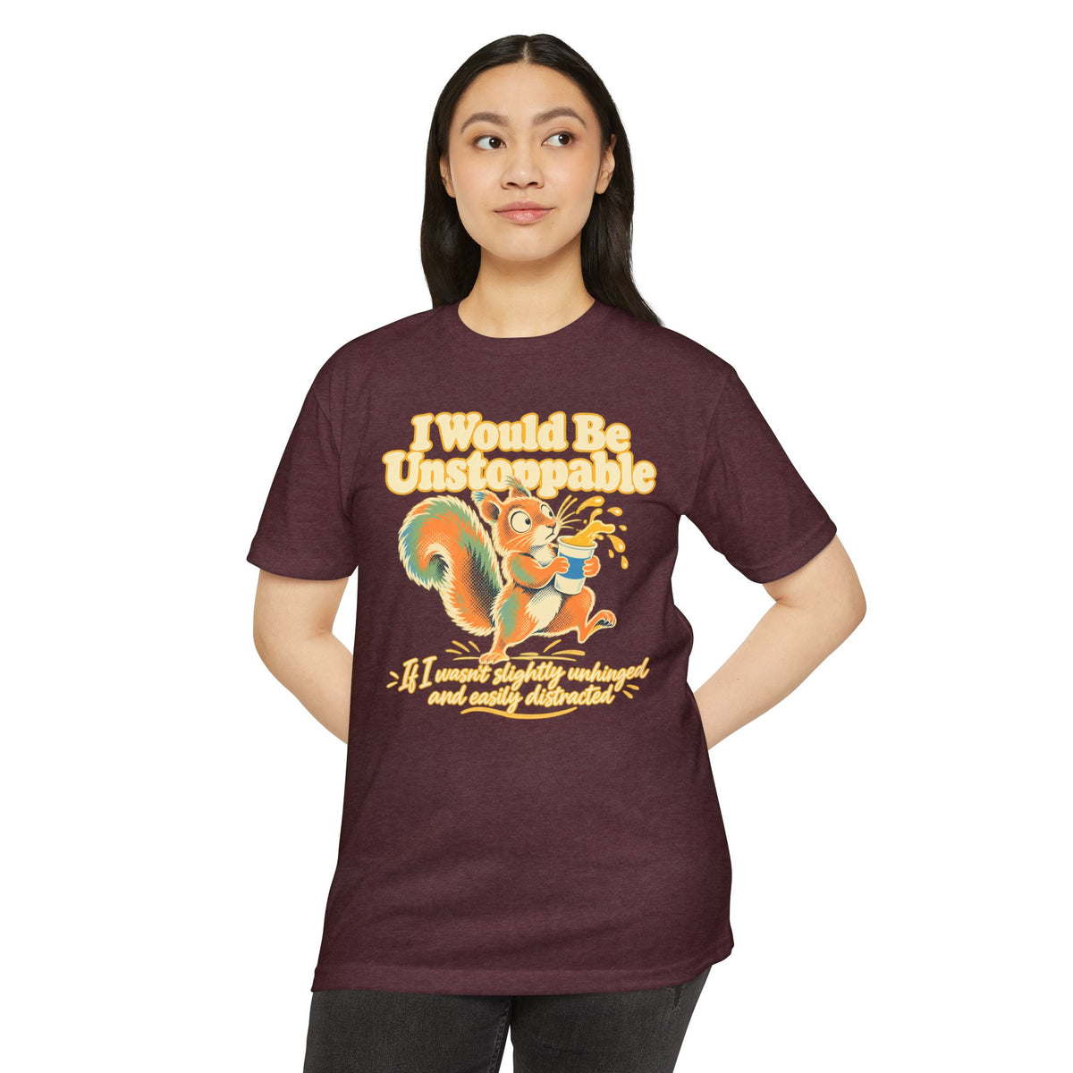 Maroon T-shirt with colorful squirrel graphic and yellow headline text