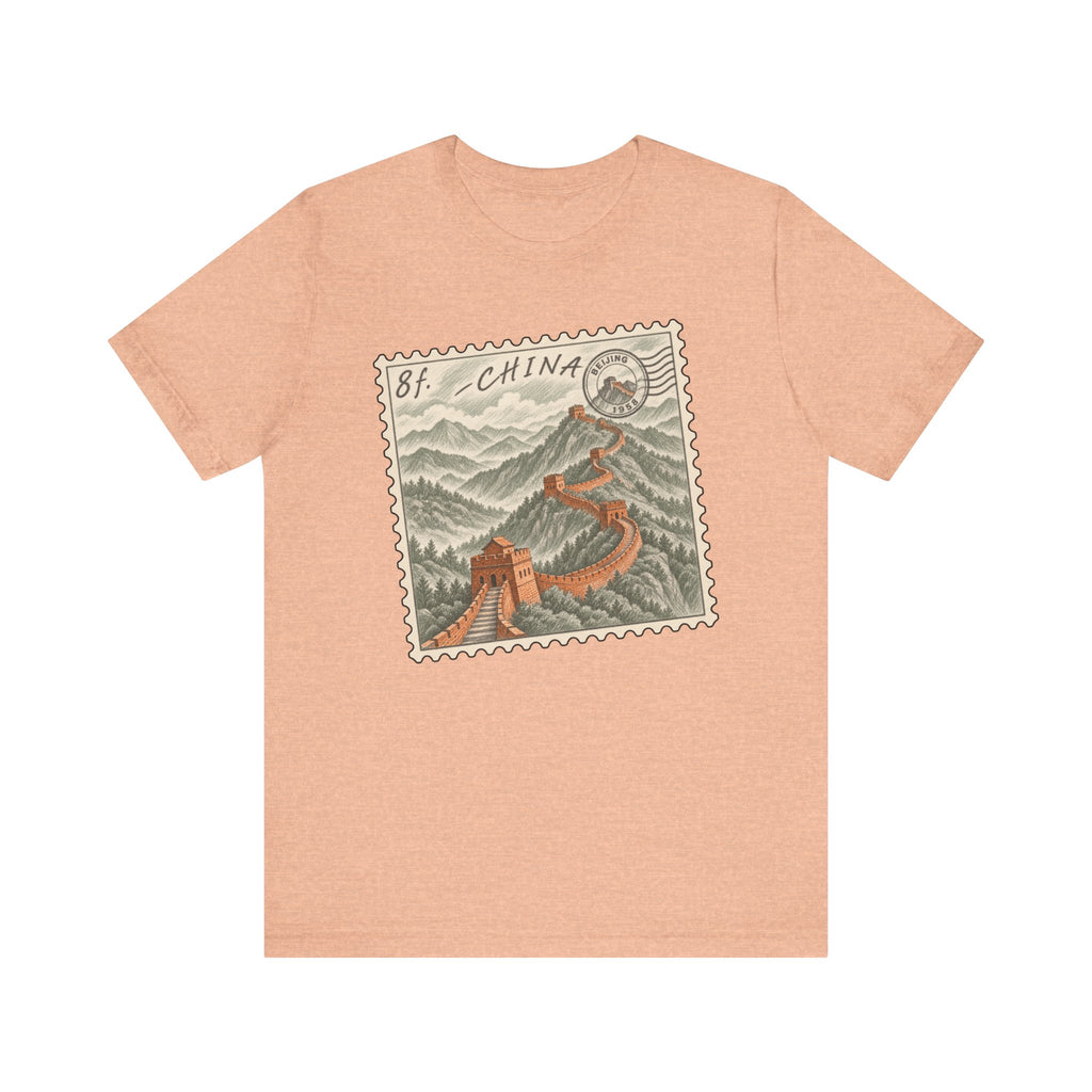 Heather peach short-sleeve tee with vintage postage stamp graphic of the Great Wall