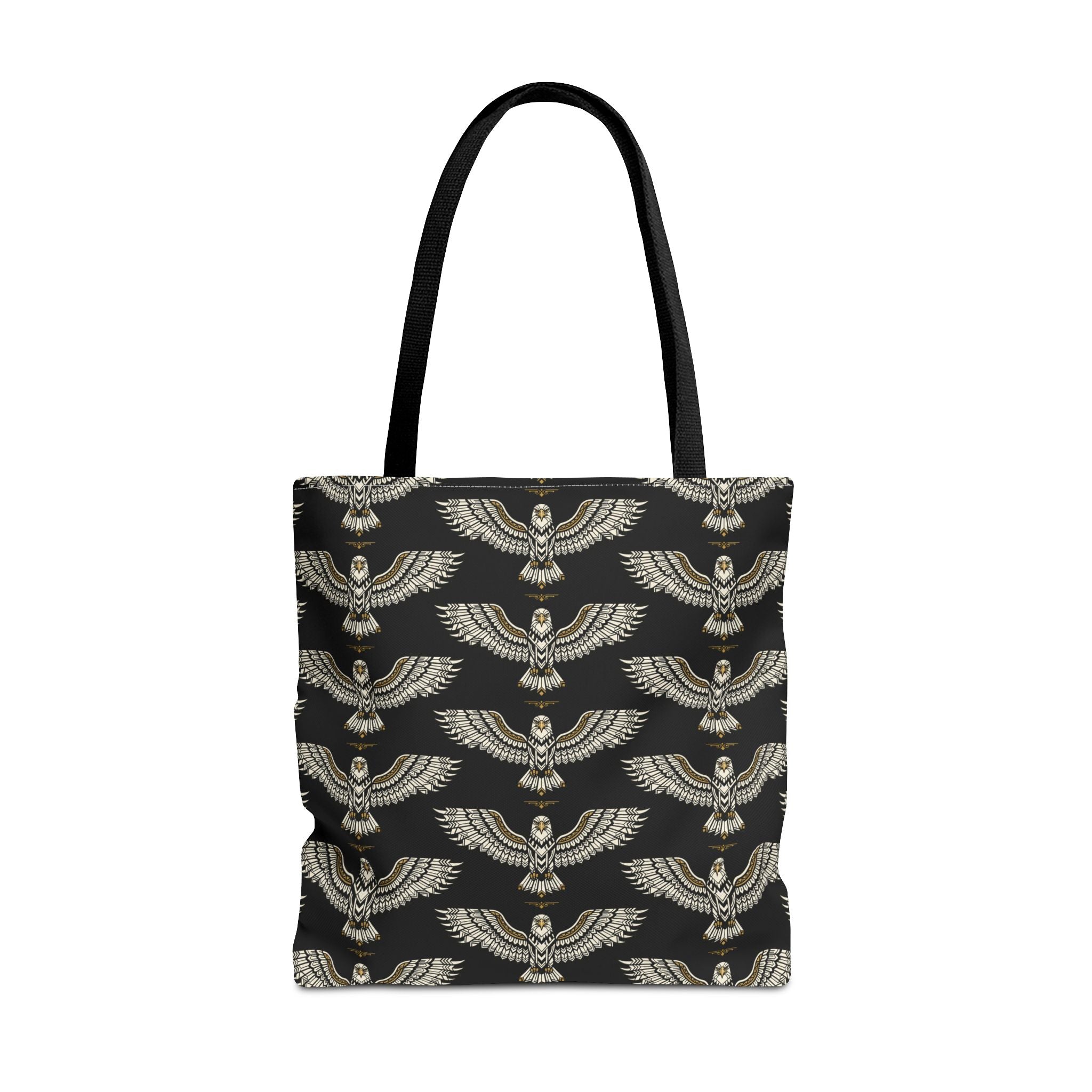 Tote bag with black fabric and repeating gold winged scarab pattern, black handles