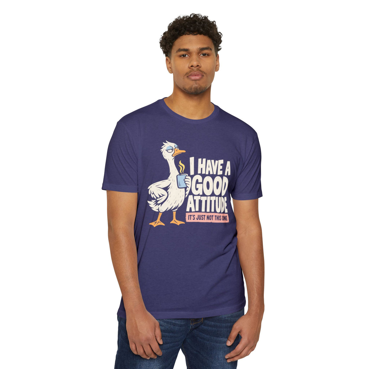 Purple graphic t-shirt with white goose and orange attitude slogan on front