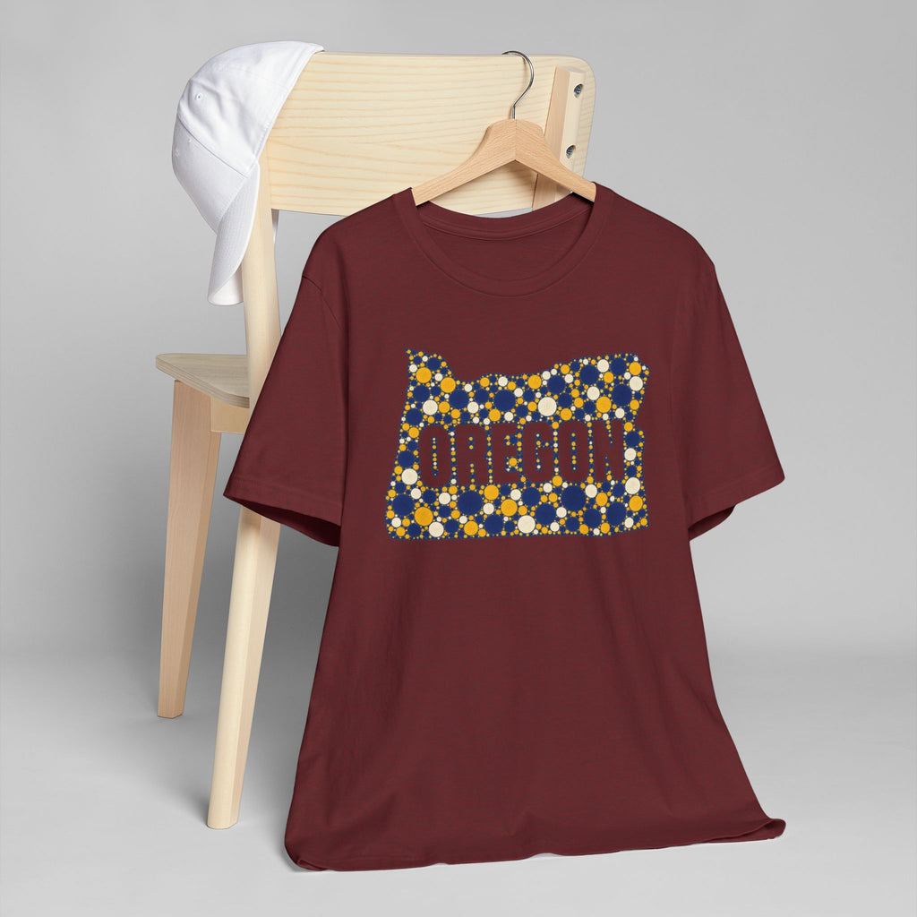 Dark red crewneck T-shirt with colorful Oregon polka dot map graphic on front