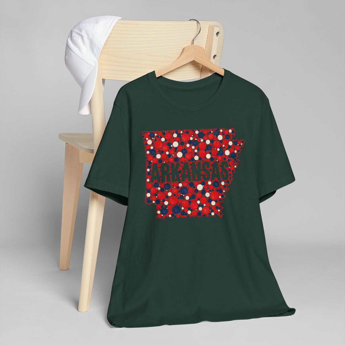 Dark green crewneck t-shirt with red, blue, white Arkansas graphic on chest