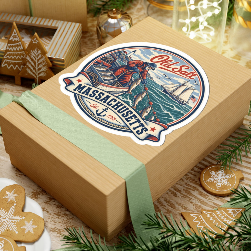 Old Salt Massachusetts sticker on wrapped gift, featuring “MASSACHUSETTS” text and sailboat