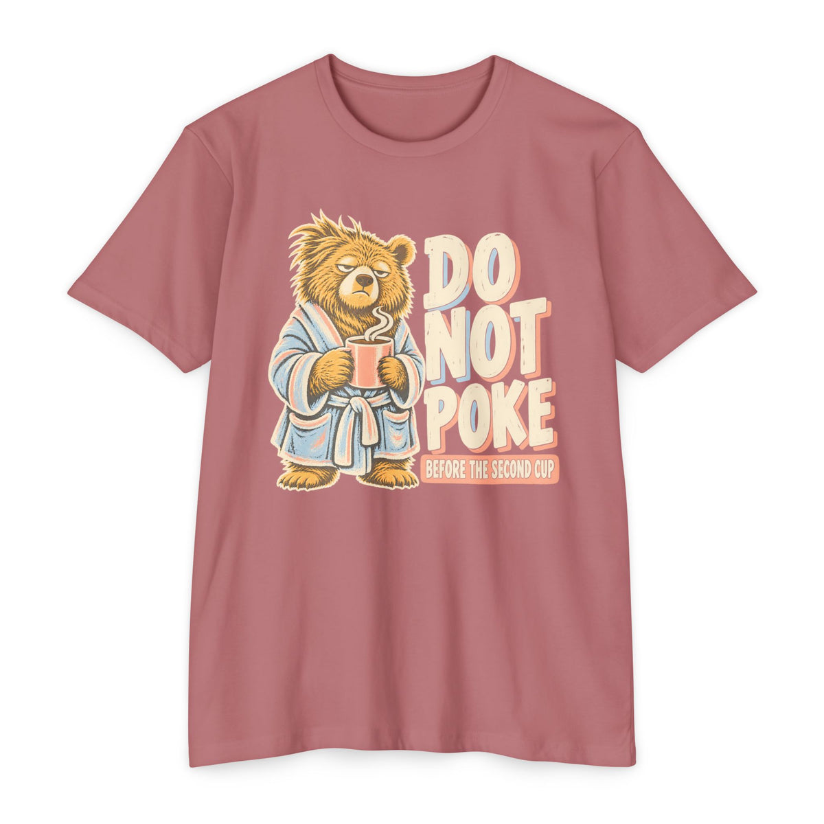Pink t-shirt with grumpy bear holding a cup and “DO NOT POKE” graphic on front.