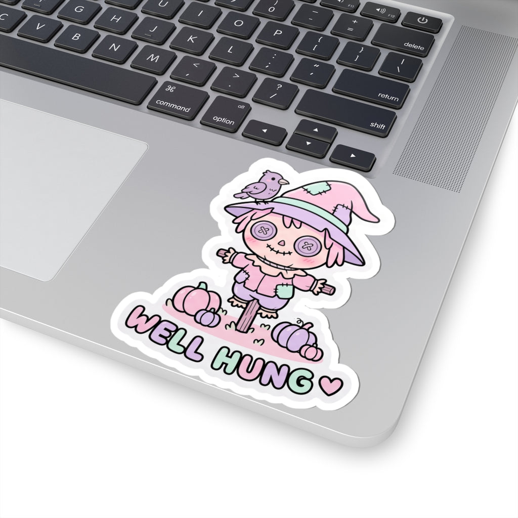 Pastel scarecrow bunny kiss-cut sticker with bird on hat and “WELL HUNG” lettering