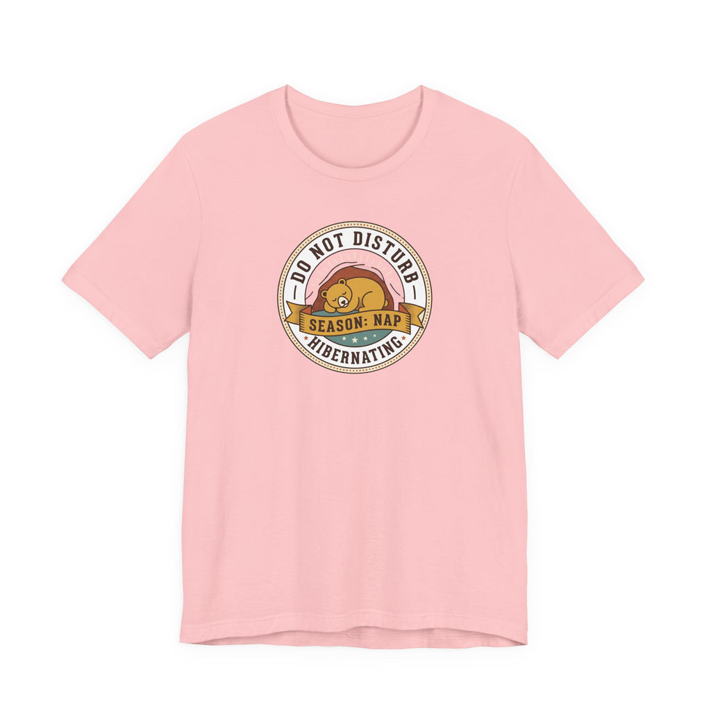 Light pink T-shirt with circular sleeping bear graphic on front