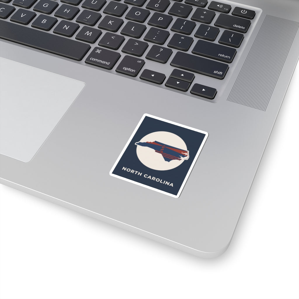 North Carolina state map kiss-cut sticker, blue border with ship graphic