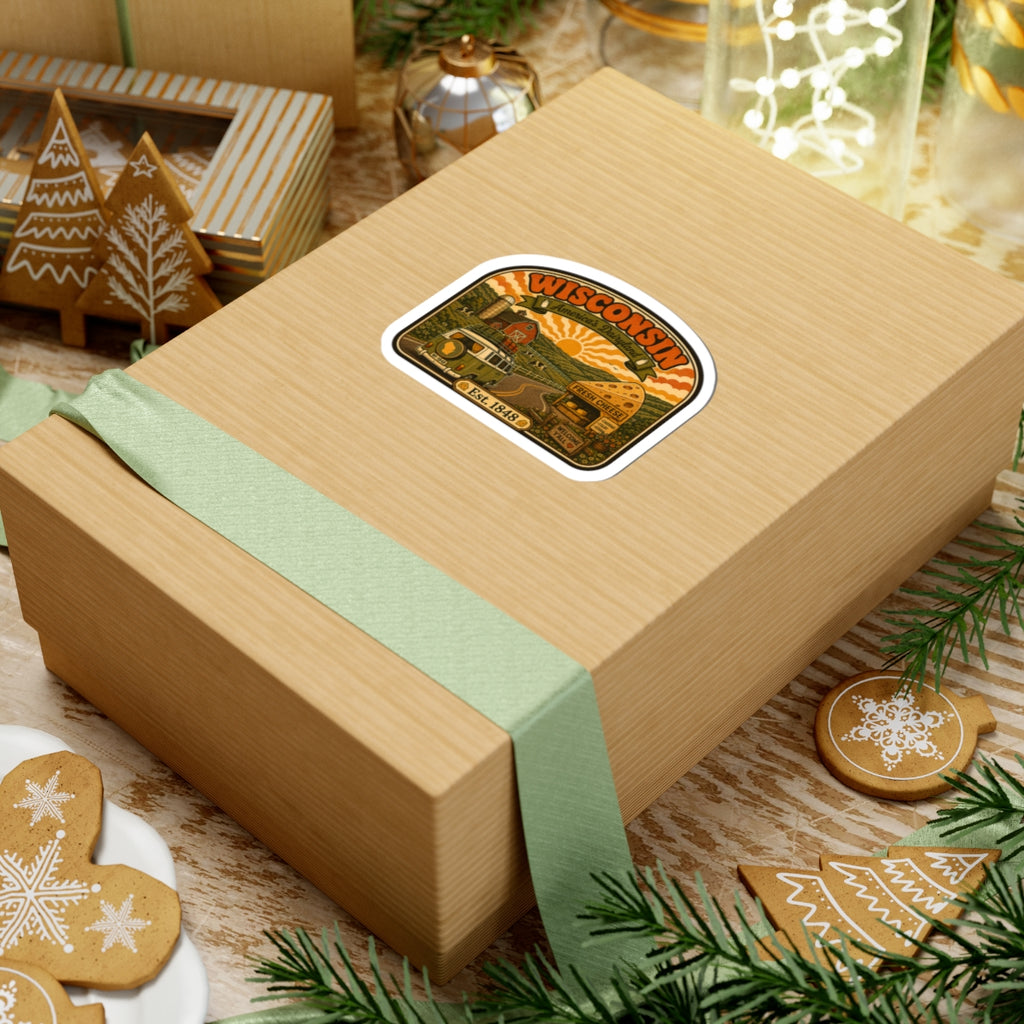 Die-cut Wisconsin dairyland sticker with truck, barn, and orange sun over countryside, Est. 1848