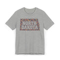 Heather gray T-shirt with colorful “NORTH DAKOTA” floral map graphic on front