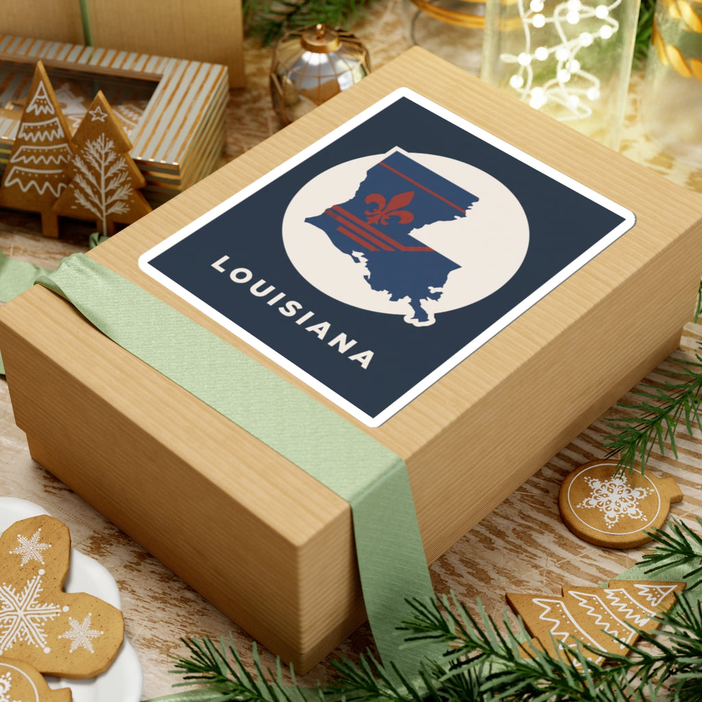 Louisiana sticker on gift box lid with state silhouette, fleur-de-lis emblem, and "LOUISIANA"