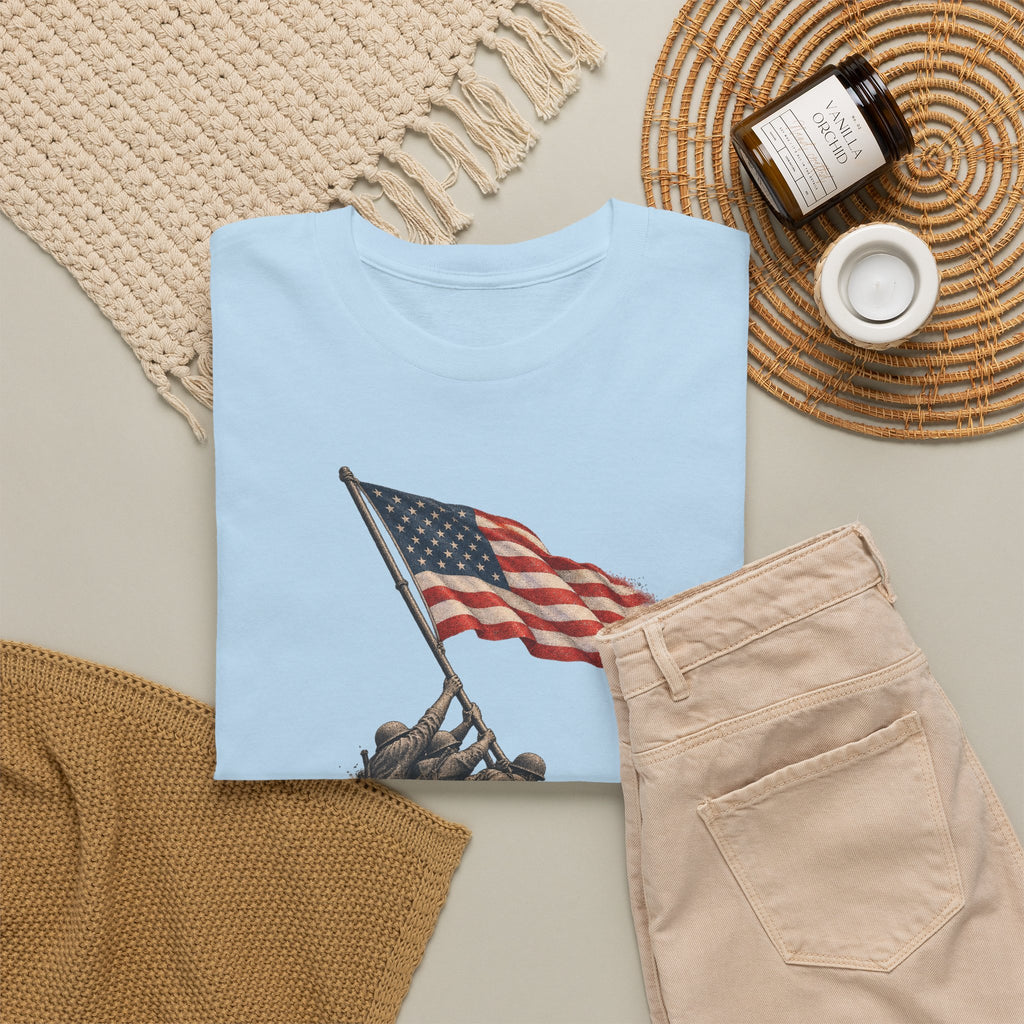 Light blue T-shirt with U.S. flag on pole graphic across the front