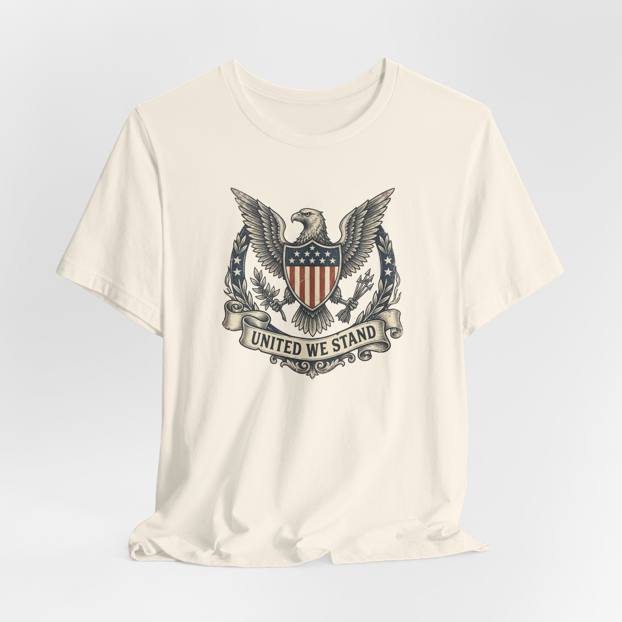Cream crewneck T-shirt with United We Stand shield-and-eagle graphic on front