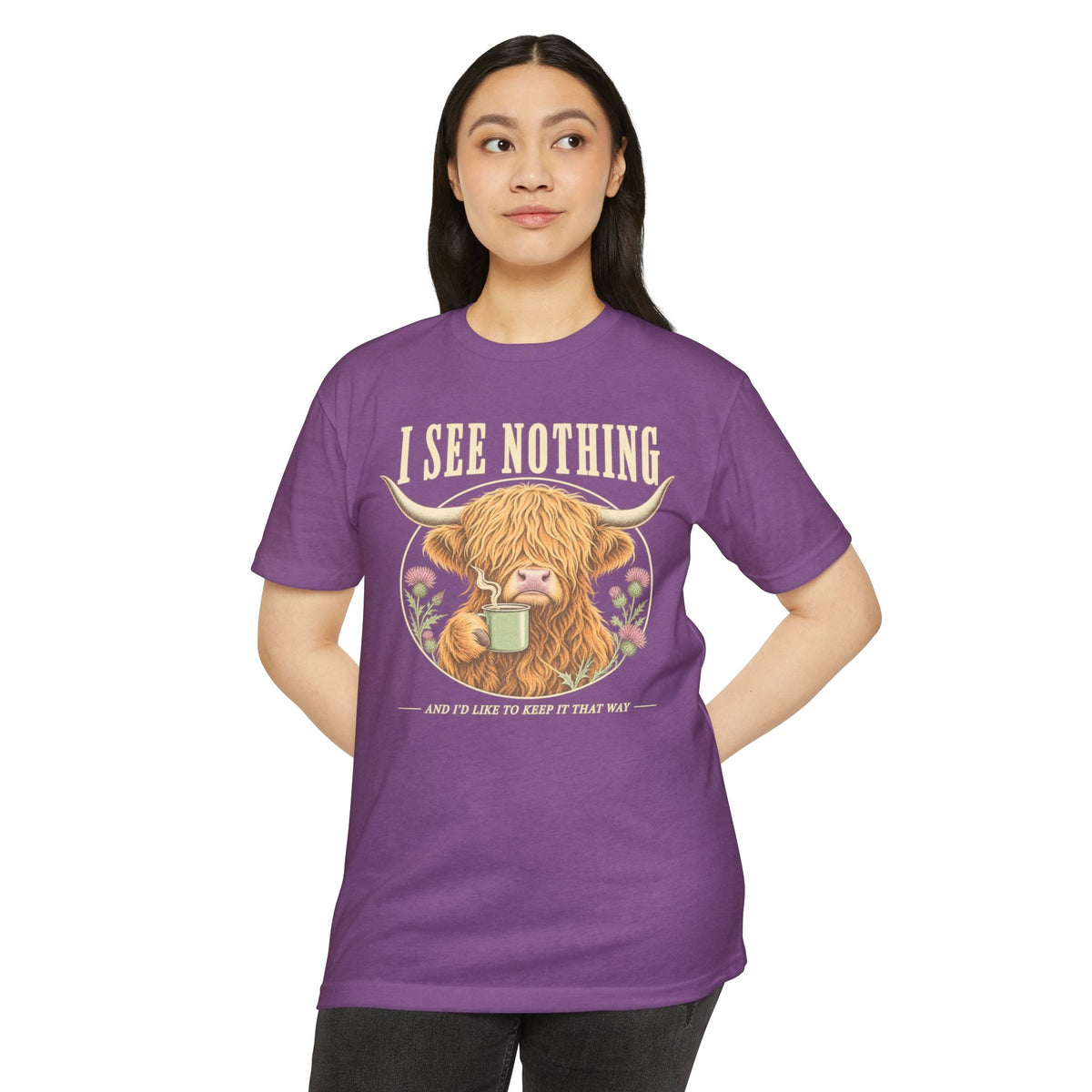 Purple short-sleeve T-shirt with Highland cow graphic and “I see nothing” text