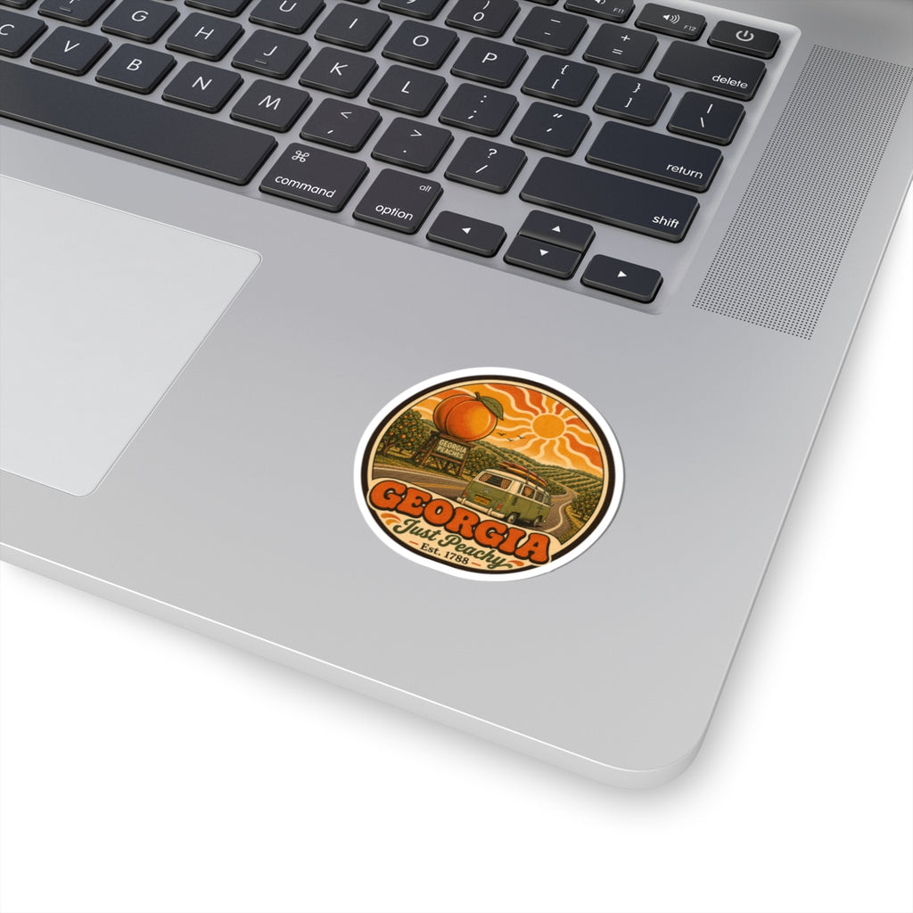 Round orange peach Georgia vinyl sticker on laptop