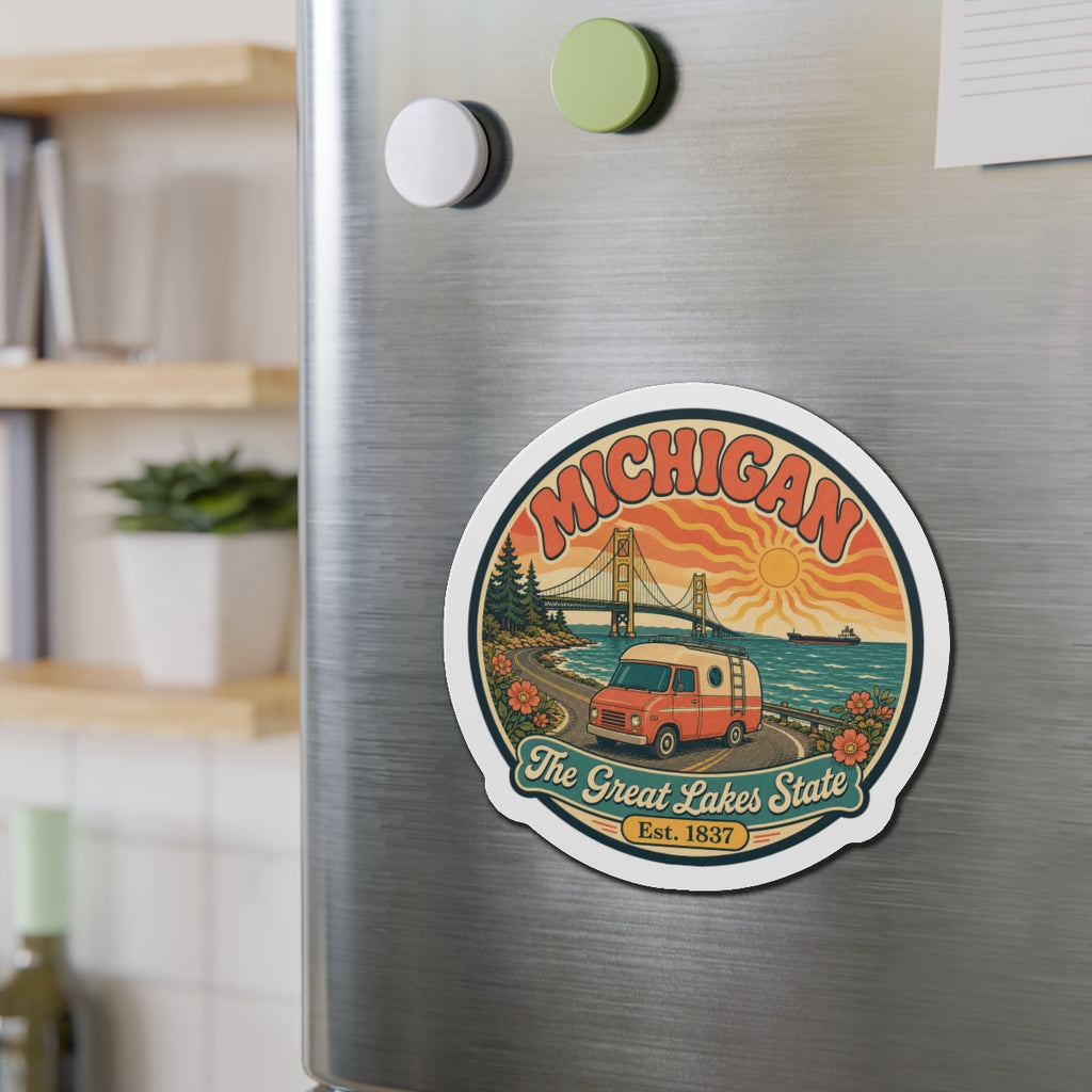 Round die-cut Michigan magnet with camper van and bridge graphic, white rim and text