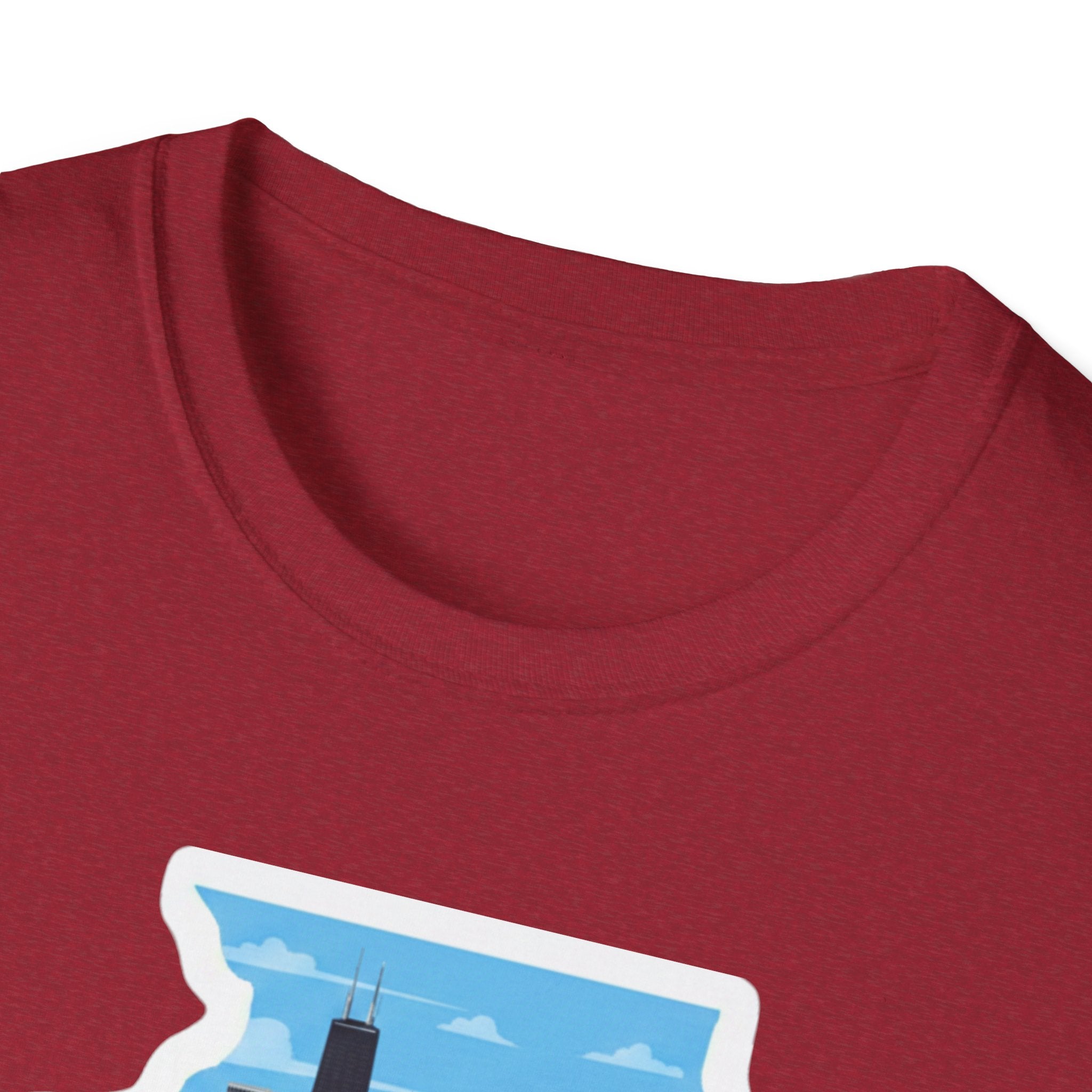 Red heather T-shirt neckline close-up with partial skyline/farmland artwork