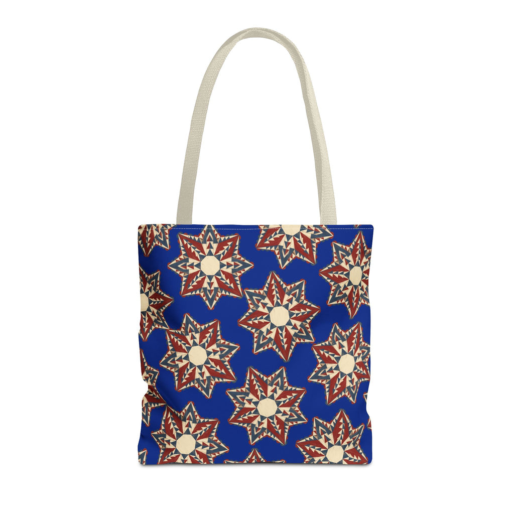 Blue tote bag with starburst floral mandala pattern and beige handles