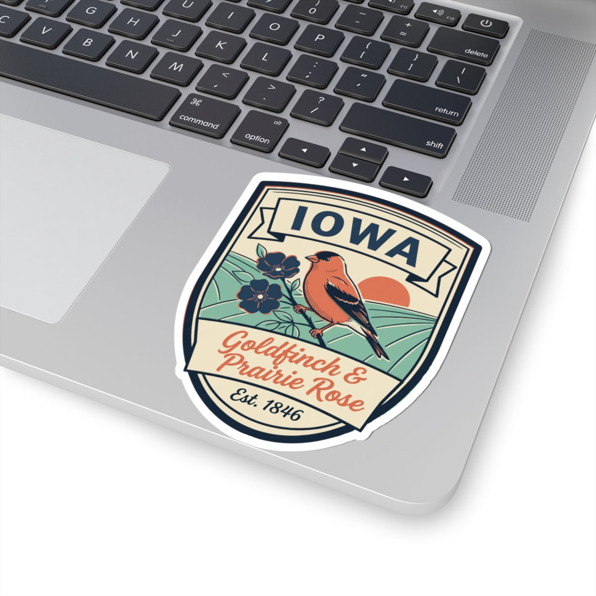 Iowa kiss-cut sticker with goldfinch and prairie rose artwork, white border