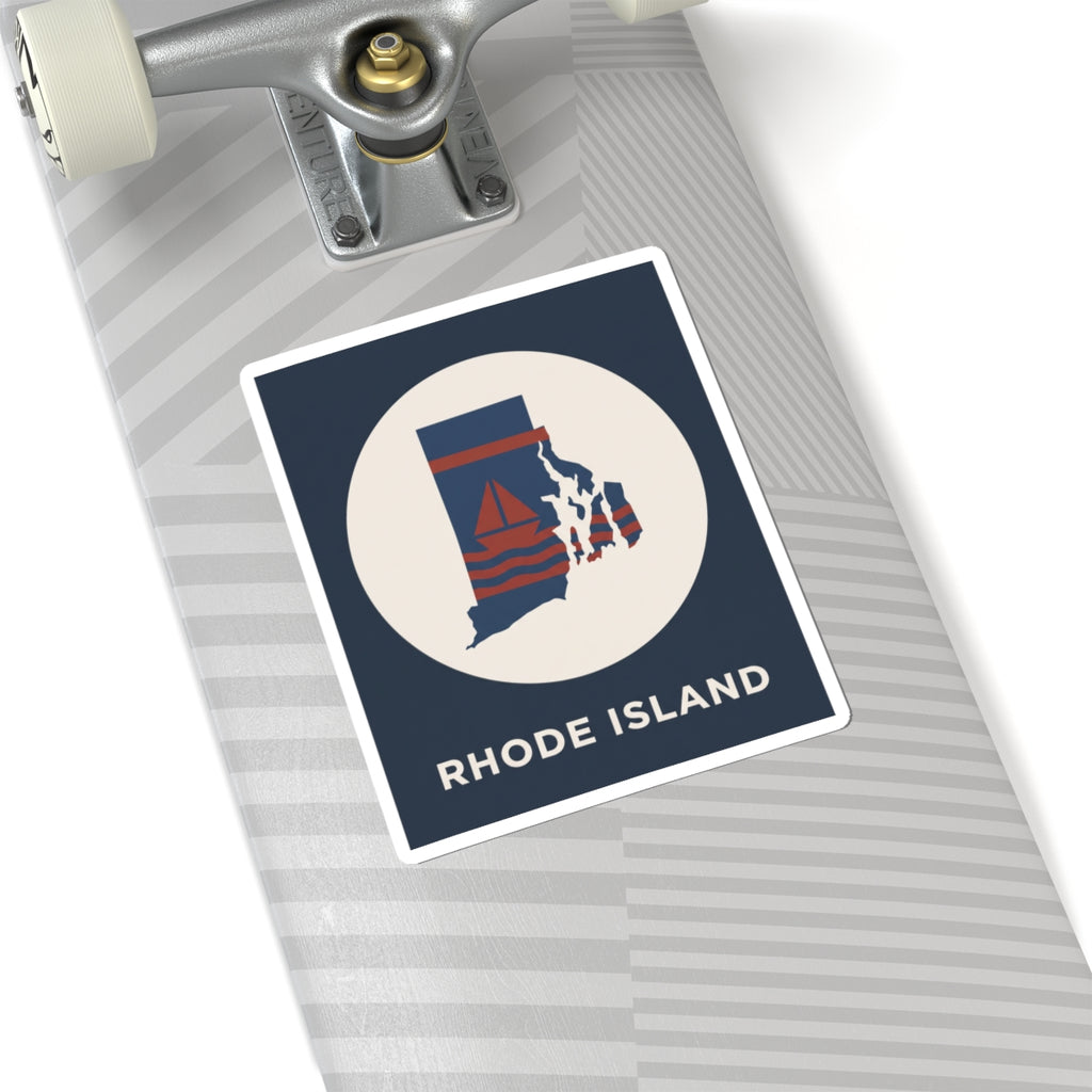 Rhode Island nautical map sticker on laptop lid, blue rectangle with circular sailboat design
