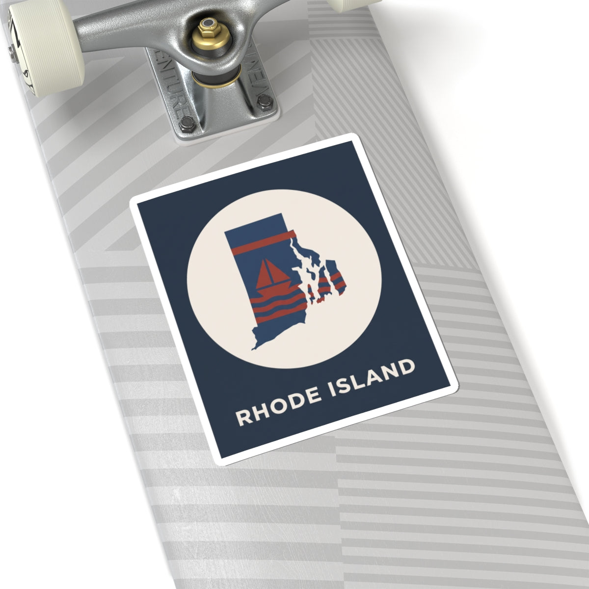 Rhode Island nautical map sticker on laptop lid, blue rectangle with circular sailboat design