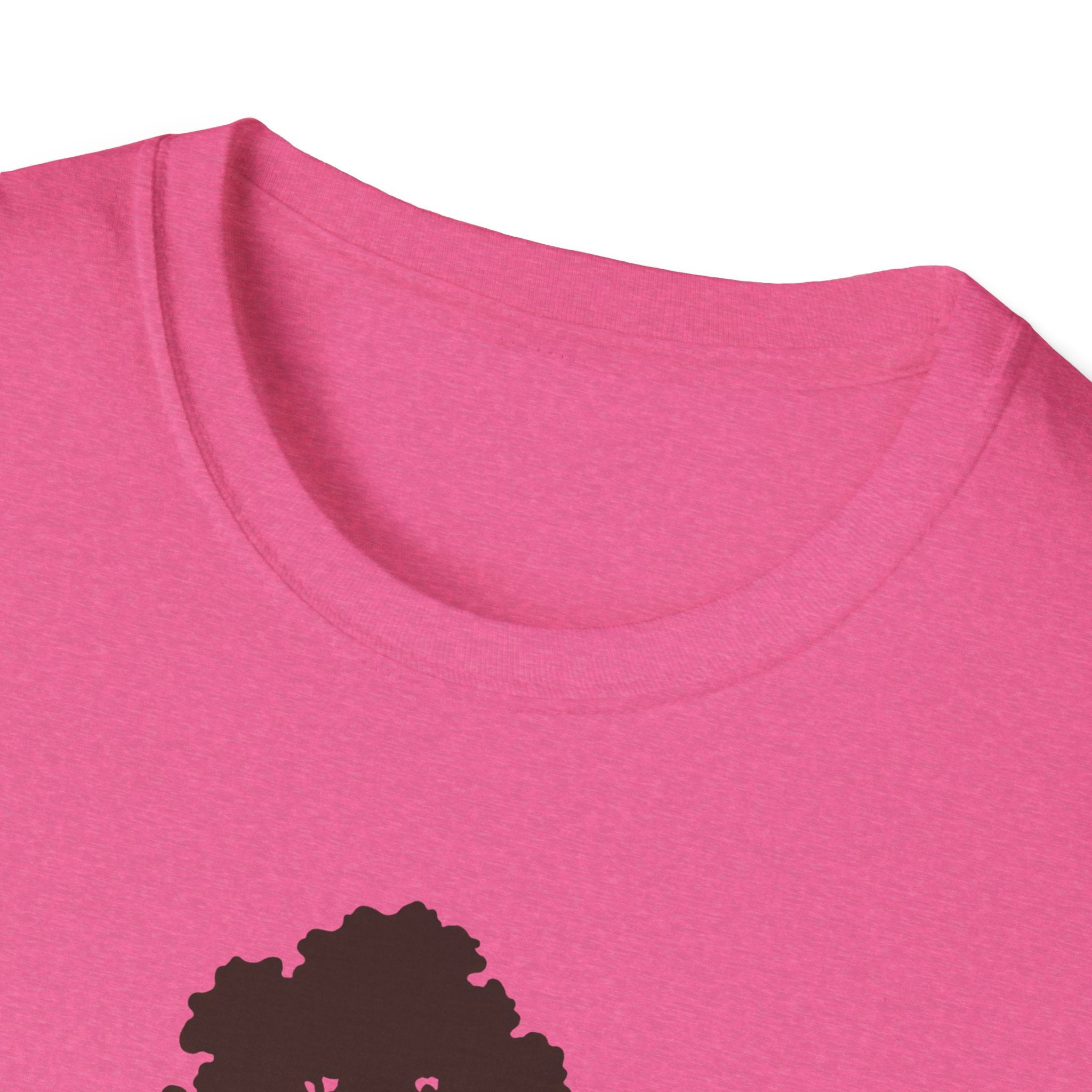 Pink T-shirt close-up of crew neck; partial sequoia tree graphic near bottom