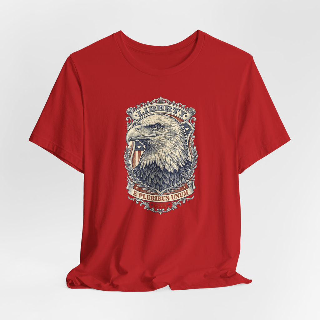 Red T-shirt with centered eagle head graphic in a circular badge