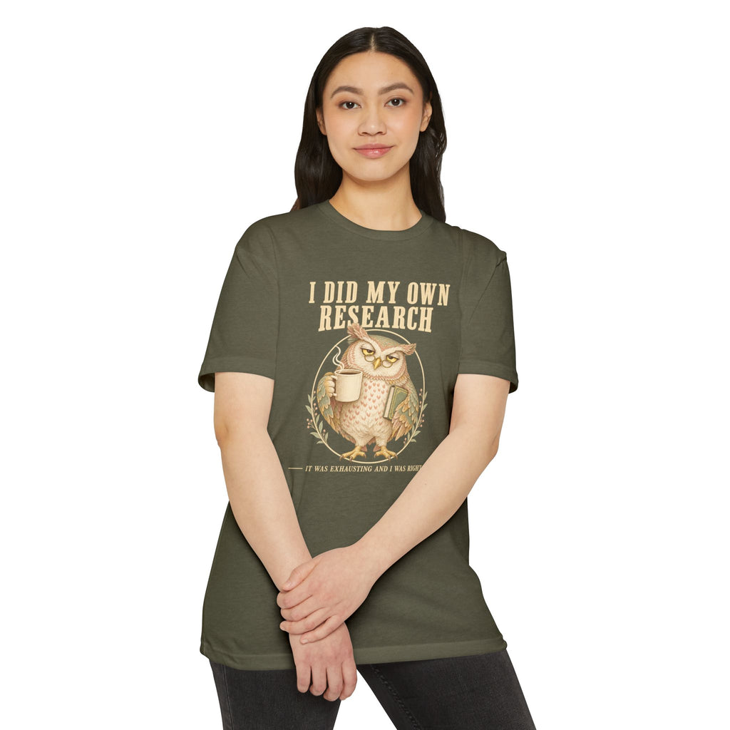 Olive green crew-neck T-shirt with owl “I did my own research” graphic on front.