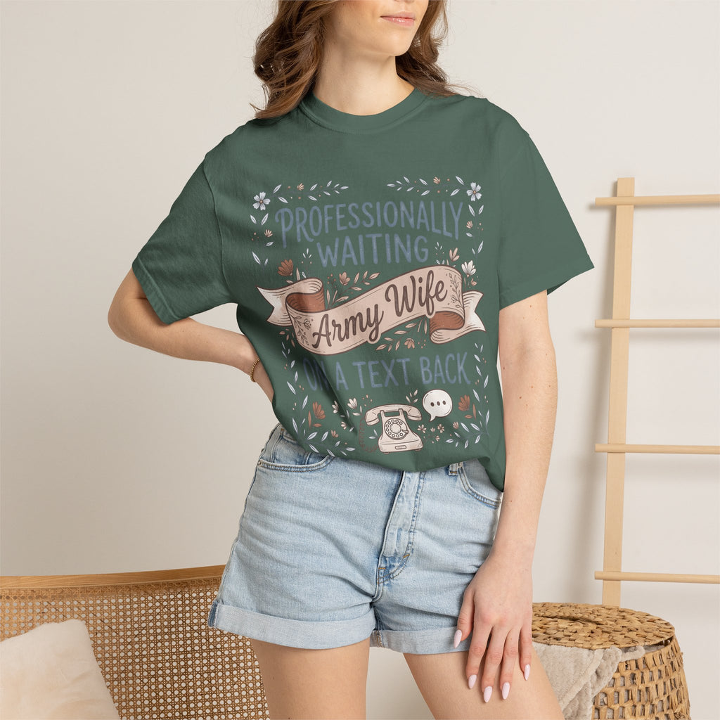Teal women’s crewneck graphic t-shirt with ribbon banner and floral text on front