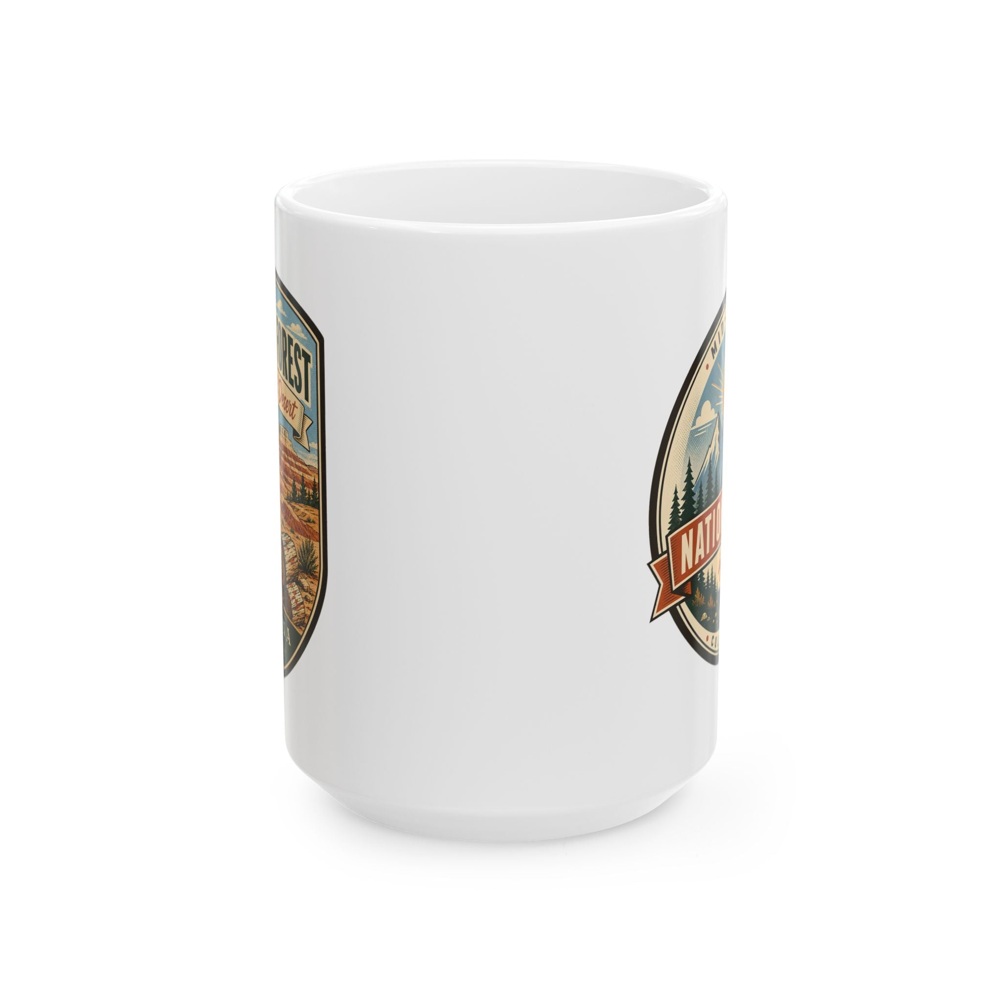 White ceramic mug with side graphic badge in a shield frame, desert and trees