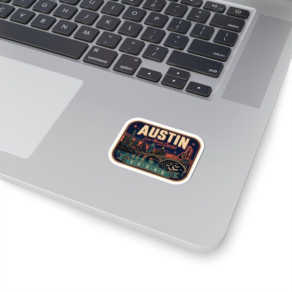 Luggage tag sticker with Austin graphic and dark blue border, rounded white edges