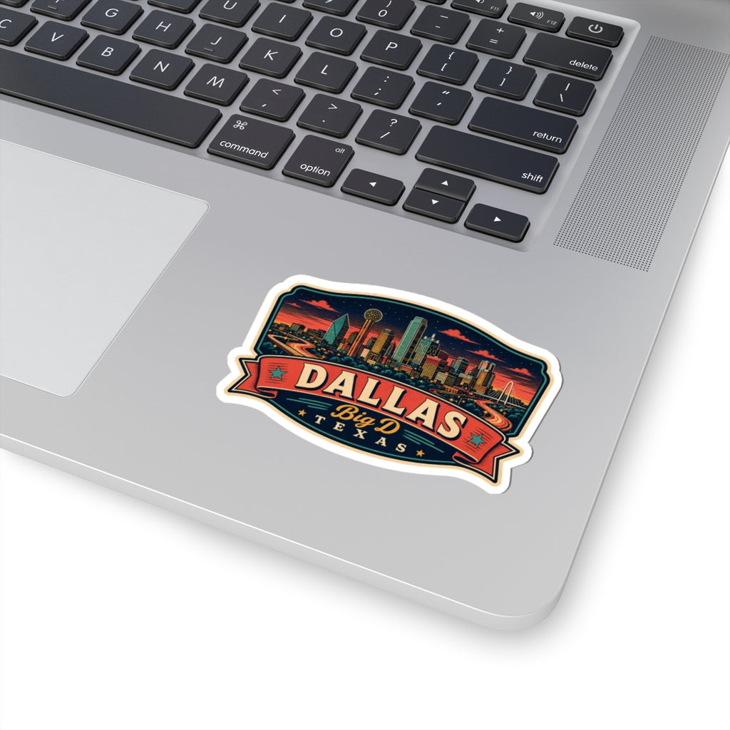 Dallas luggage tag sticker on laptop lid, red banner with Big D Texas text
