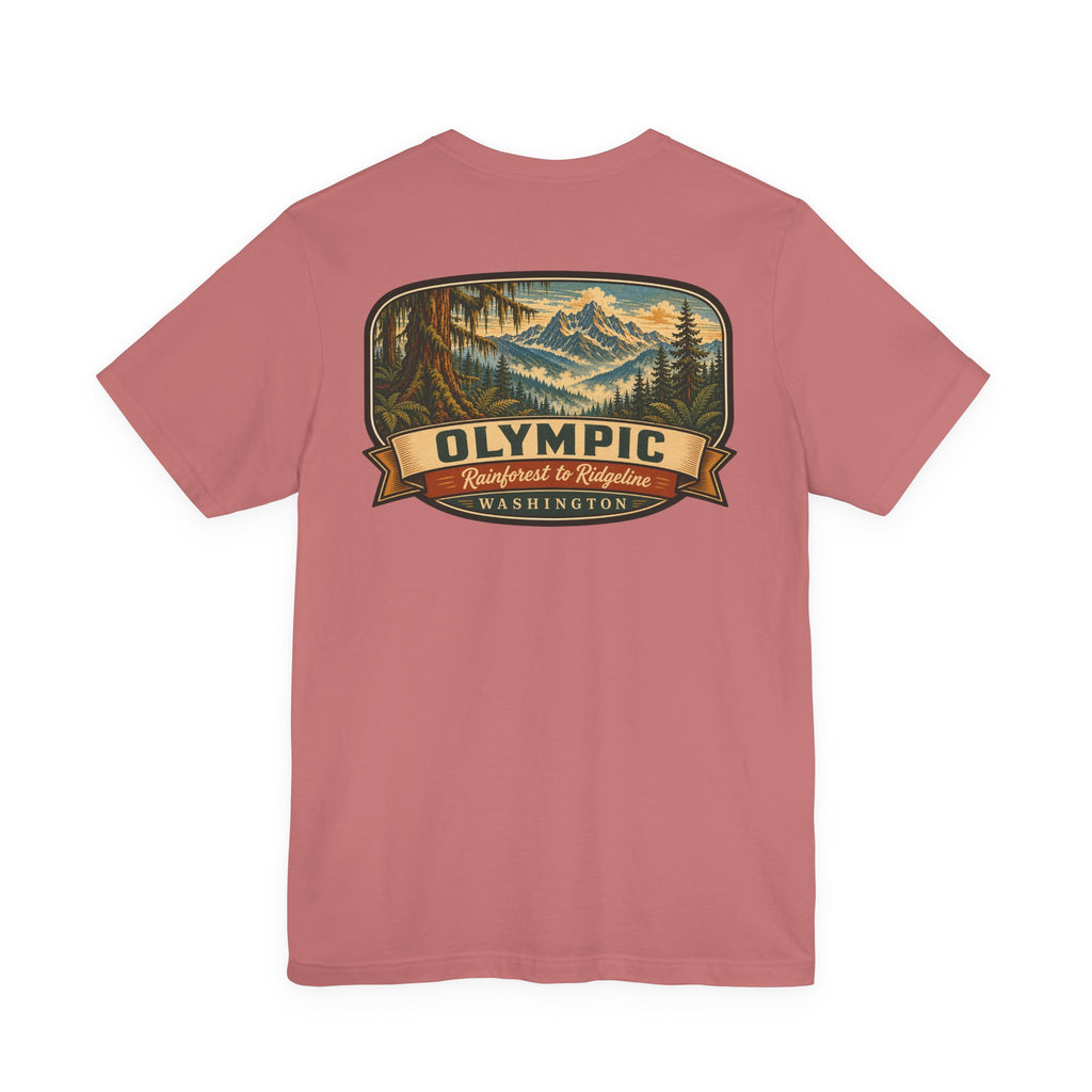 Dusty pink graphic t-shirt with Olympic mountain-and-forest ribbon emblem