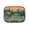 North Cascades decal sticker with blue camper van, North Cascades lettering, and sun