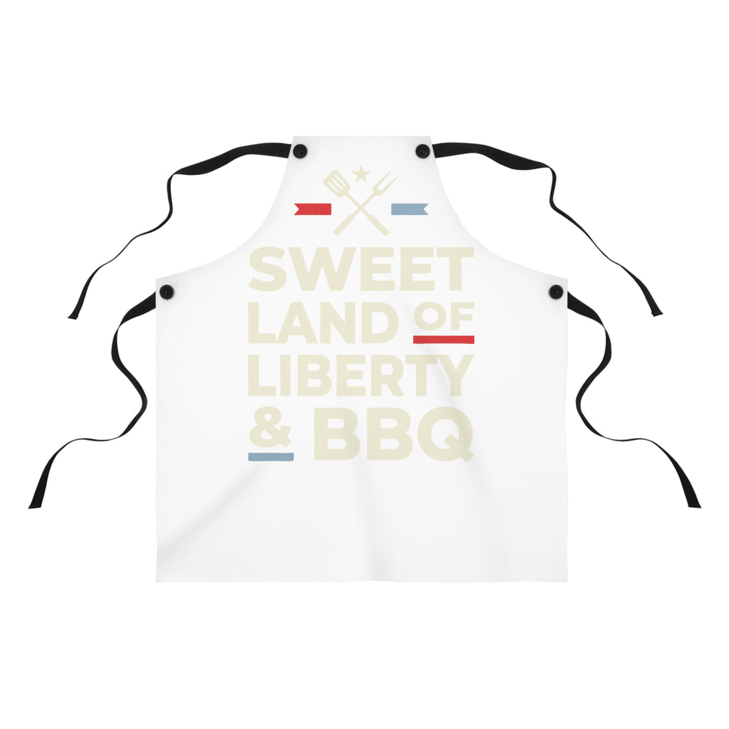 White apron with black ties, patriotic 'Sweet Land of Liberty & BBQ' text