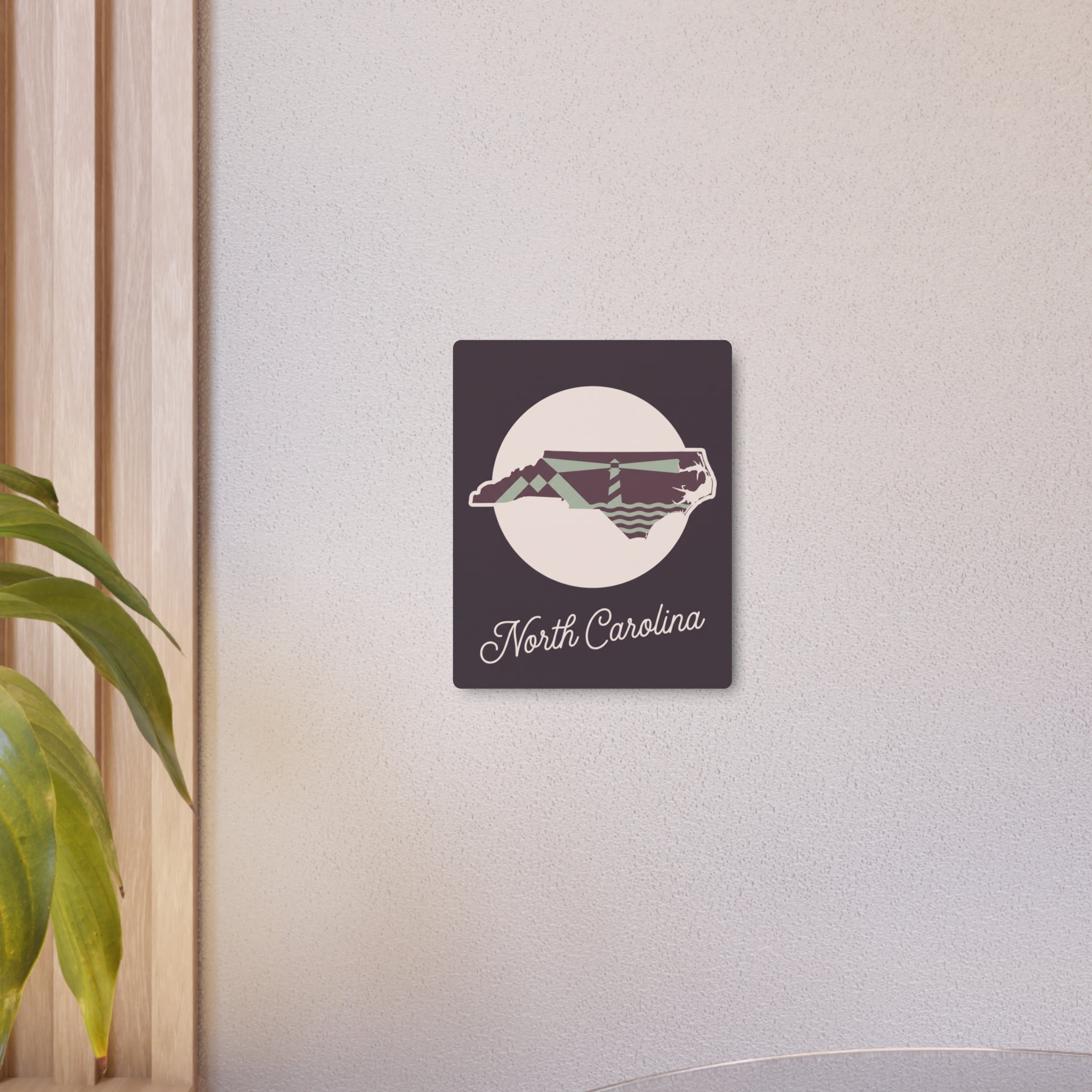 North Carolina metal wall art sign with circular emblem, map design, and 'North Carolina' script