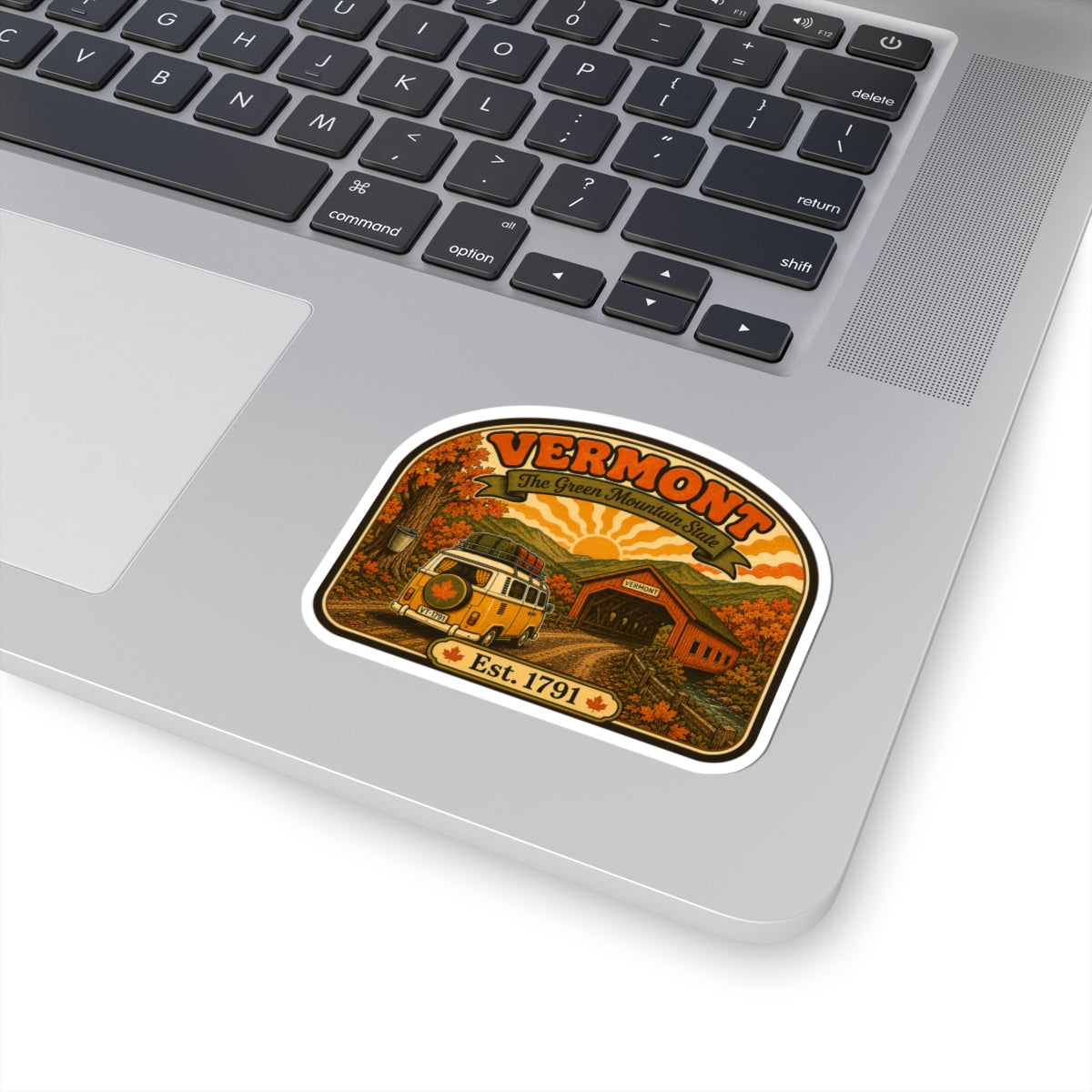 Vermont travel decal sticker with van and covered bridge artwork, arched border