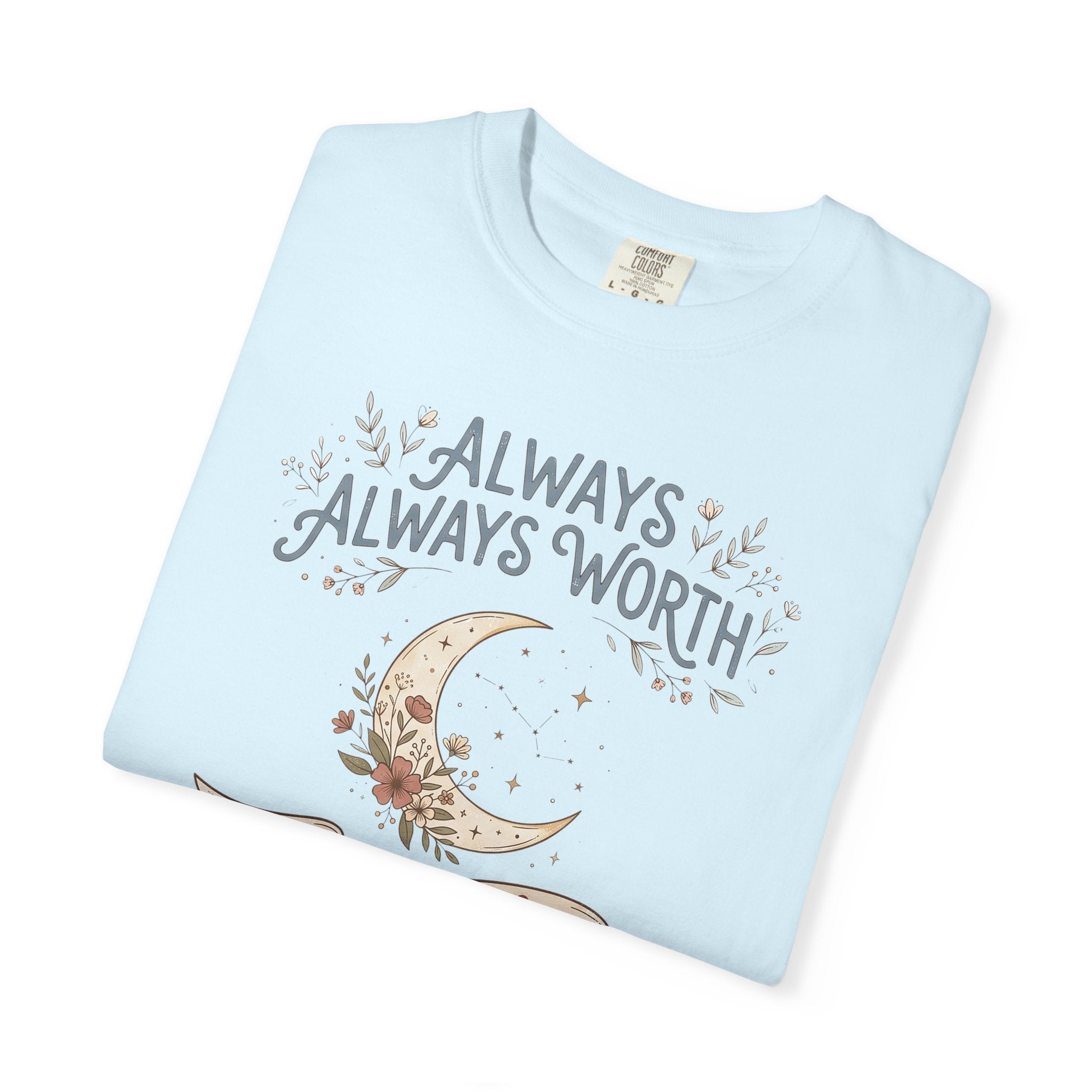 Light blue T-shirt with crescent moon and “ALWAYS WORTH” floral text graphic
