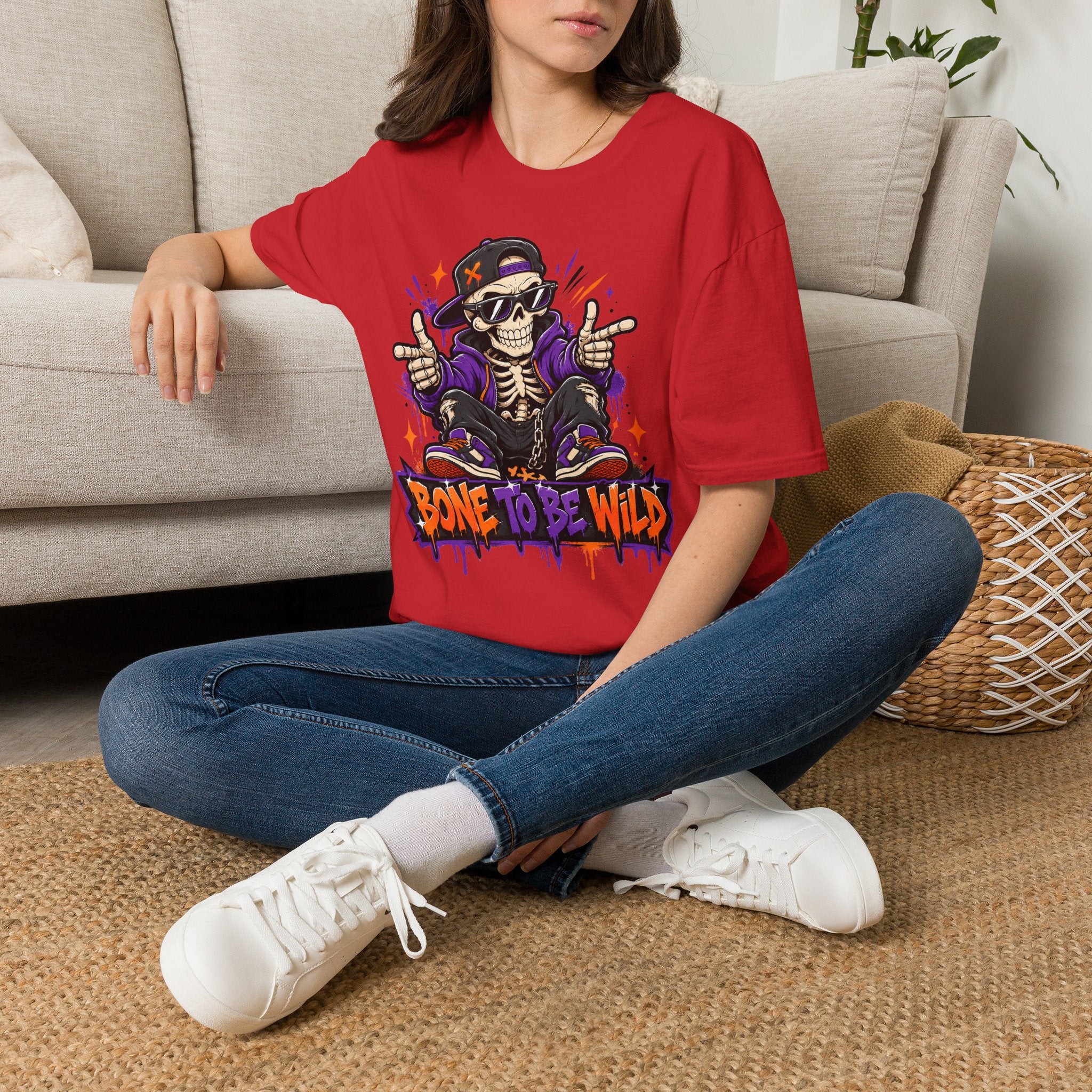 Red graphic T-shirt with DJ skeleton and “Bone To Be Wild” text