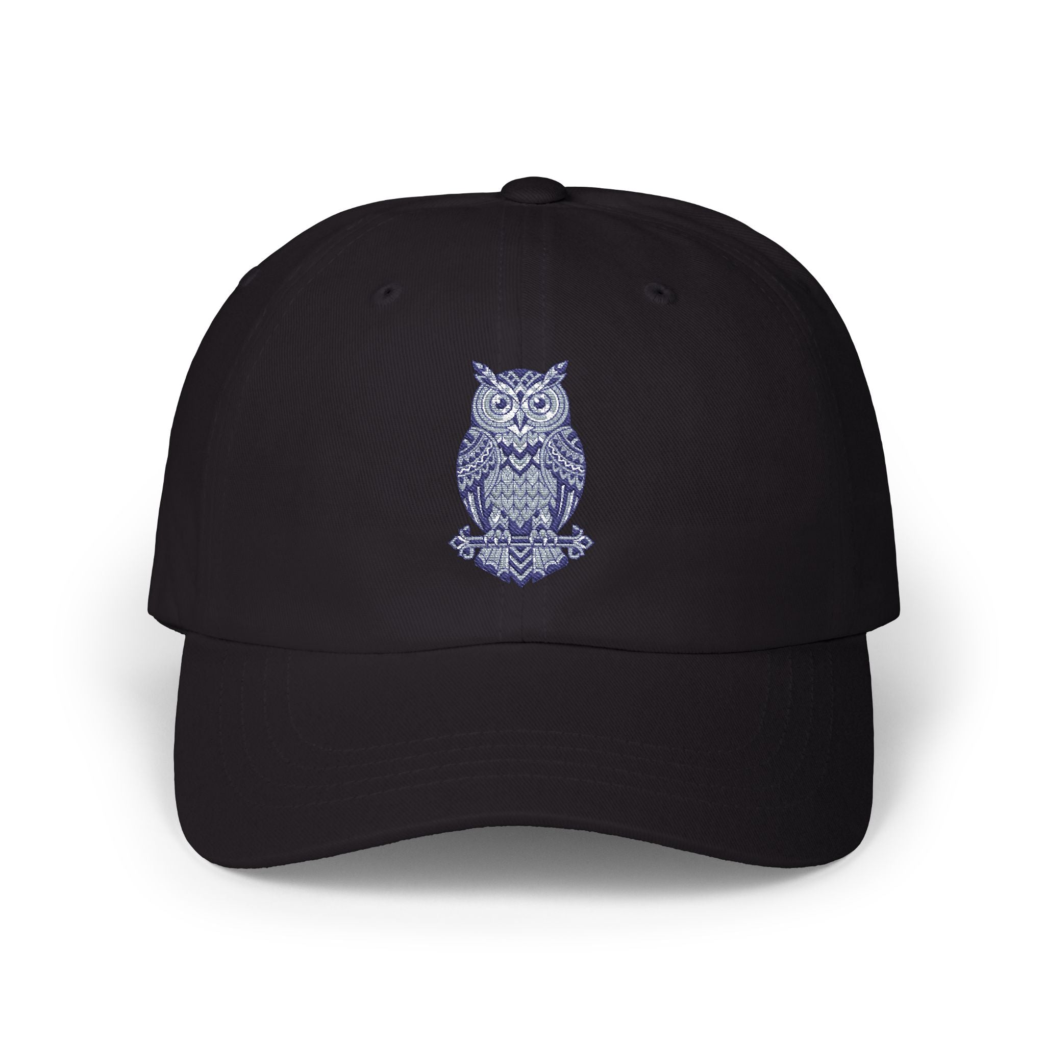 Black owl-embroidered dad cap with curved brim and stitched crown vents