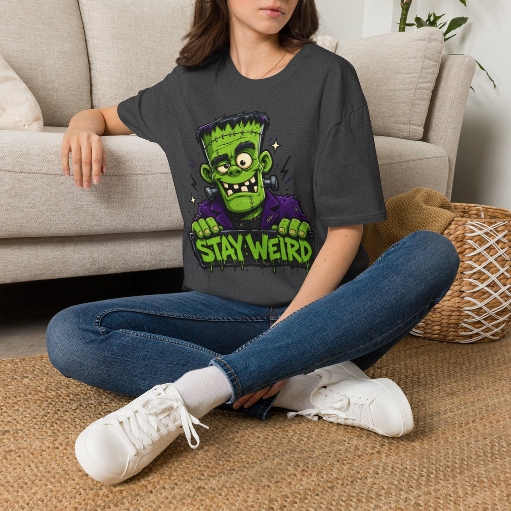 Charcoal T-shirt with cartoon Frankenstein monster graphic and neon “Stay Weird” text
