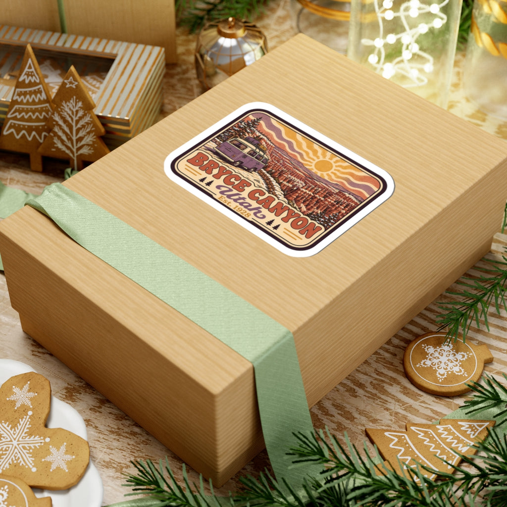 Kiss-cut Bryce Canyon Utah sticker on gift box ribbon, featuring camper van and canyon