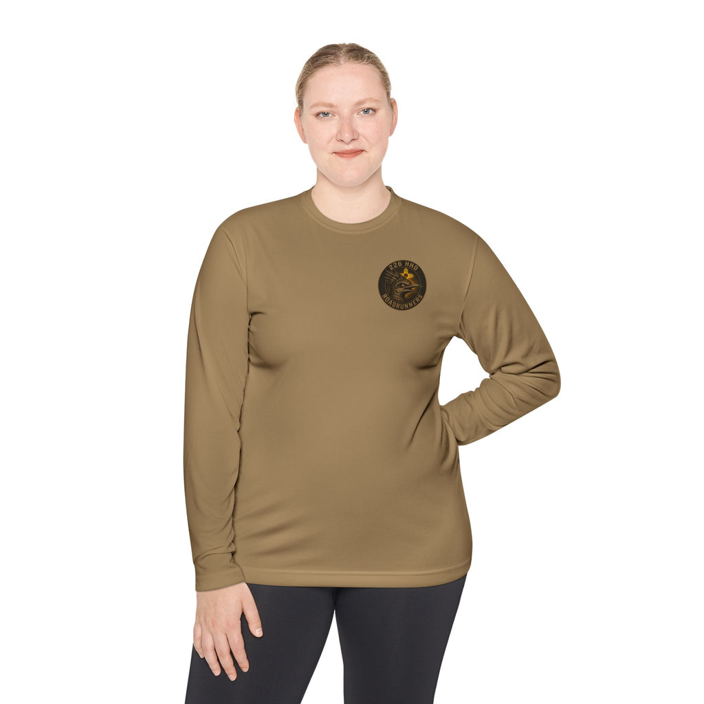Coyote brown long-sleeve polyester tee with round chest emblem, model view