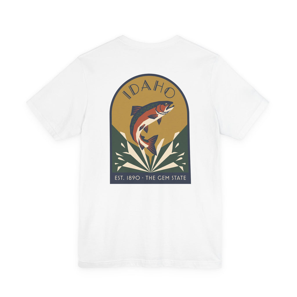 White crewneck t-shirt with circular Idaho trout badge graphic and "EST. 1890 • THE GEM STATE" text.