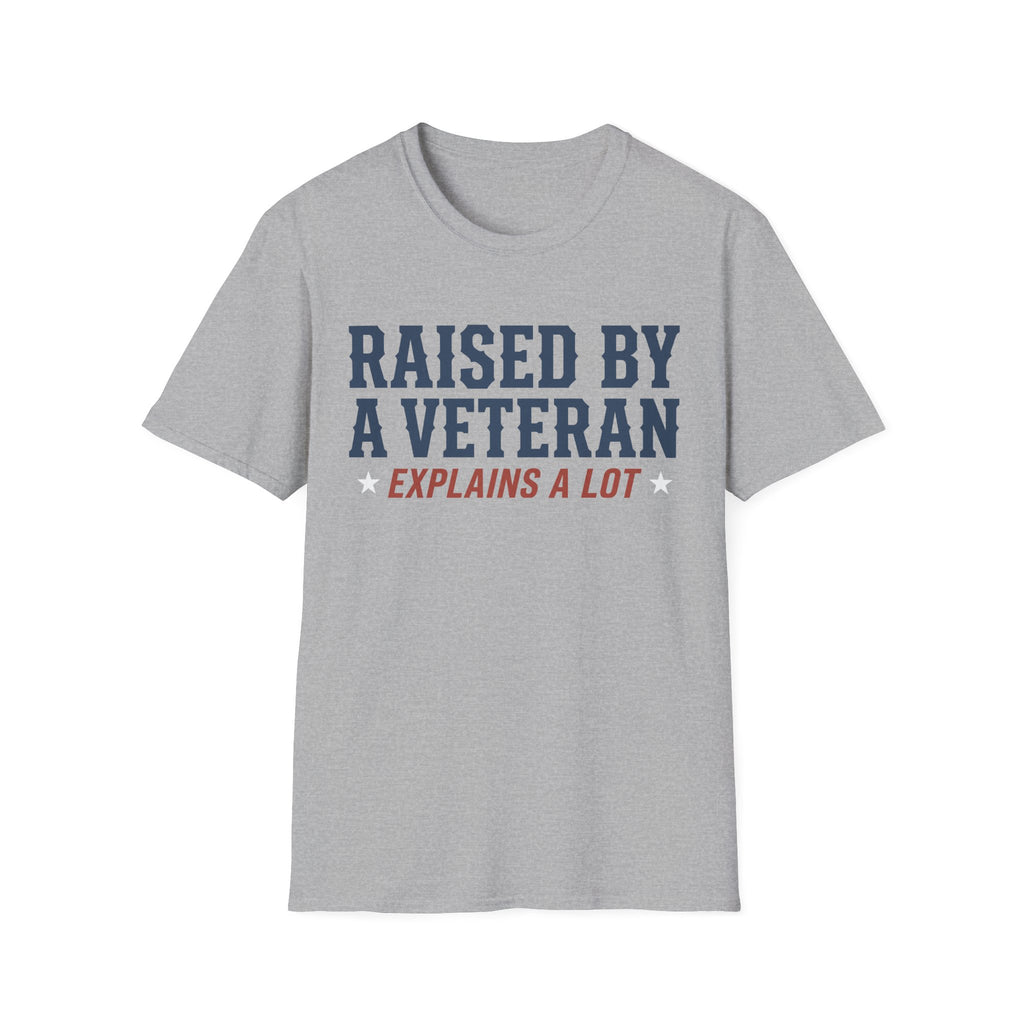 Heather gray crewneck T-shirt with 'RAISED BY A VETERAN' and 'EXPLAINS A LOT' graphic