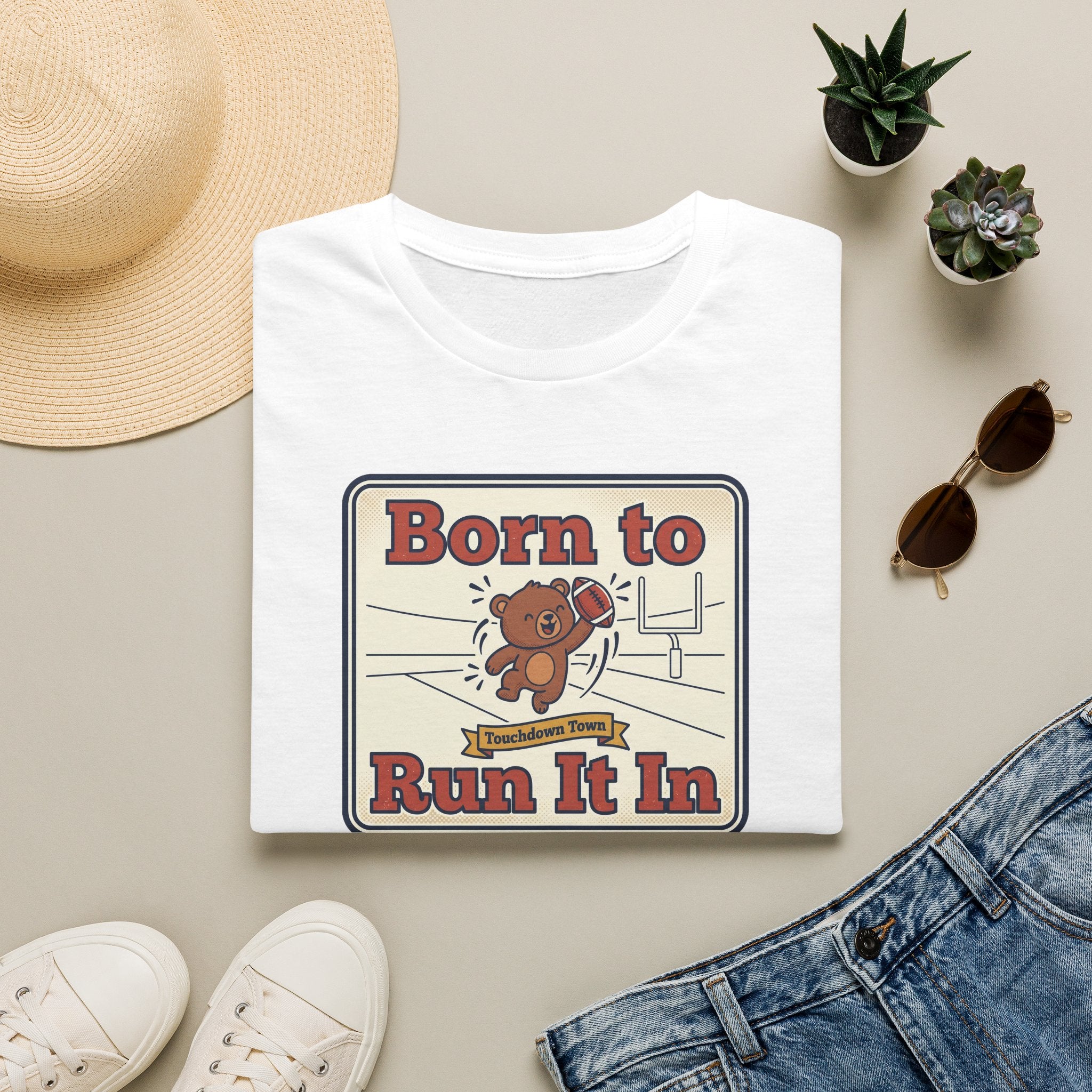White crewneck T-shirt with “Born to Run It In” sports bear graphic