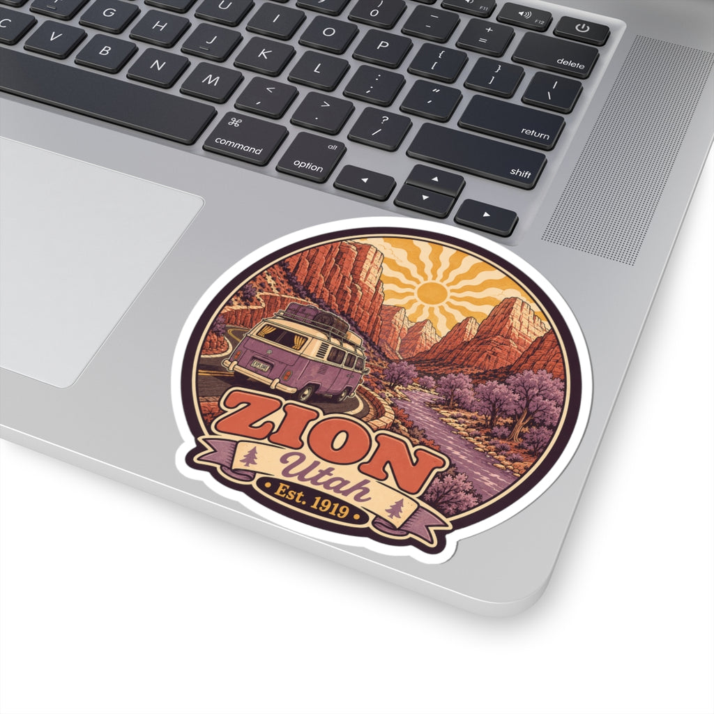 Round Zion Utah decal with purple camper van, winding road, red canyon walls, and 'ZION' text